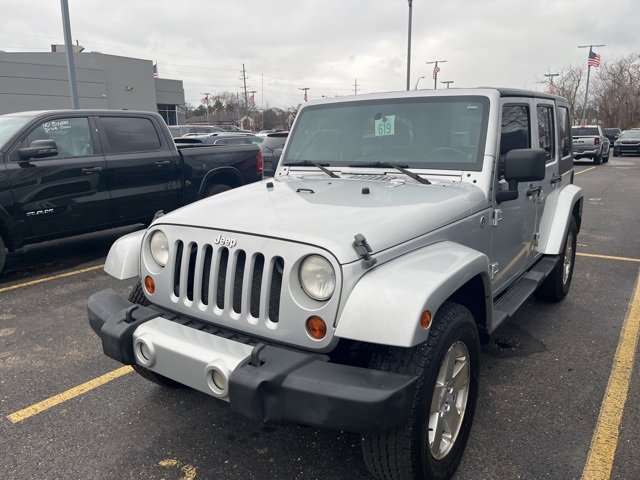 Used 2009 Jeep Wrangler Unlimited Sahara w/ Dual Top Group image 1