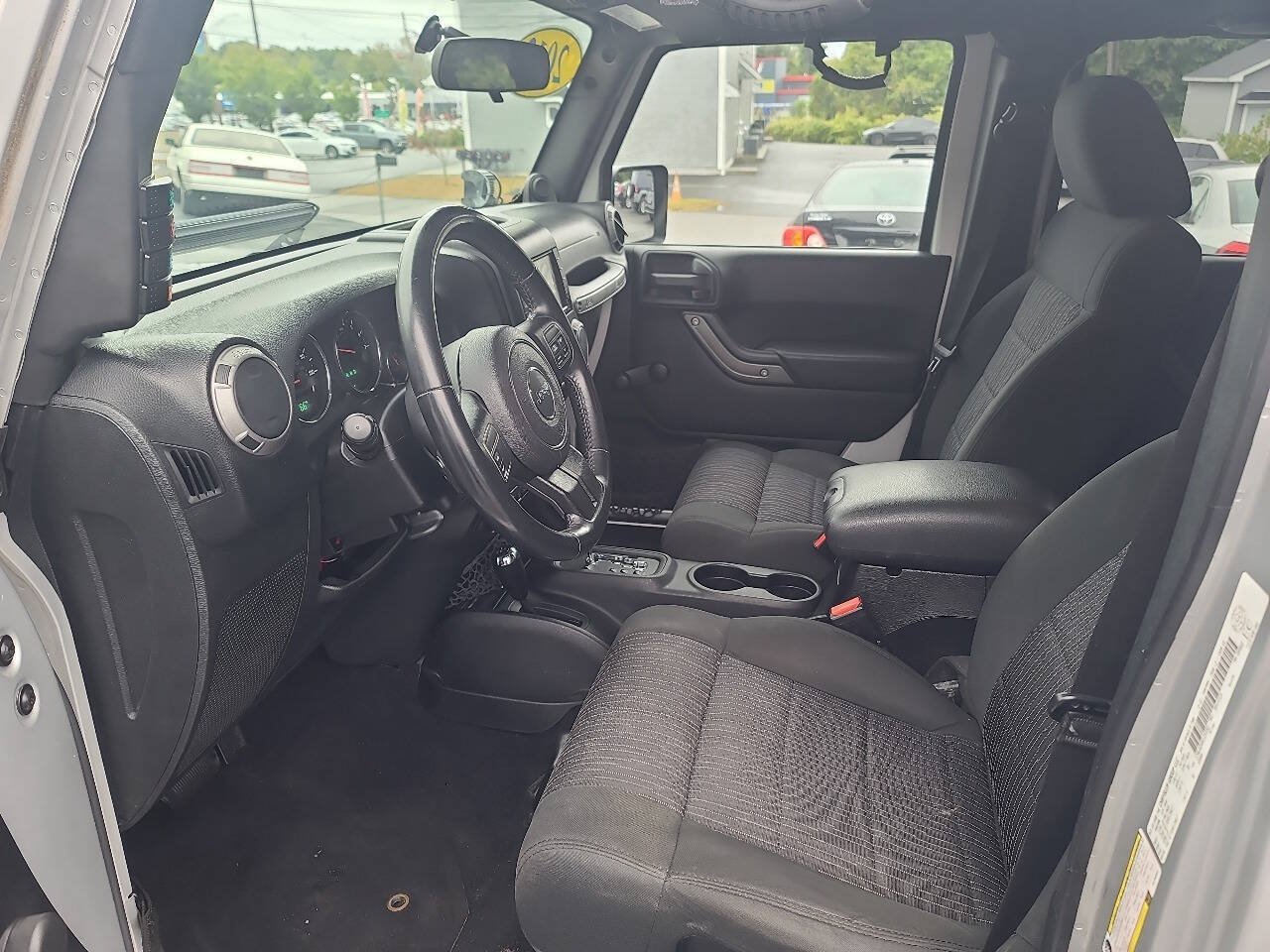 Used 2012 Jeep Wrangler Unlimited Sport w/ Dual Top Group AWD/4WD image 11
