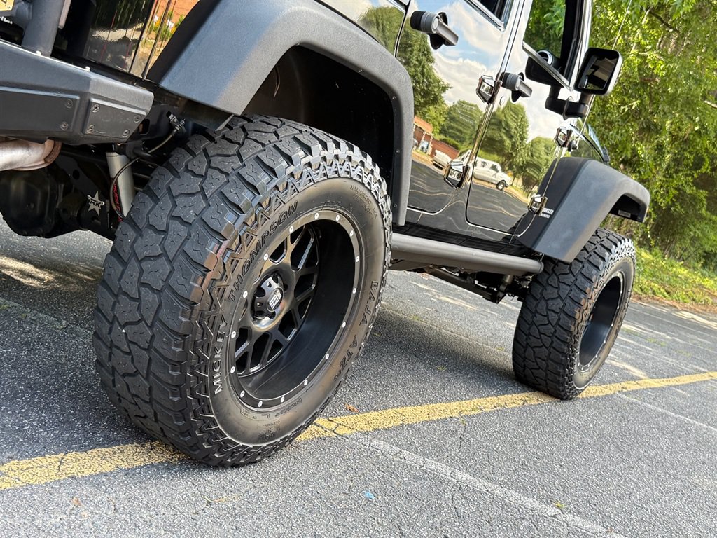 Used 2015 Jeep Wrangler Unlimited Rubicon w/ Dual Top Group AWD/4WD image 32