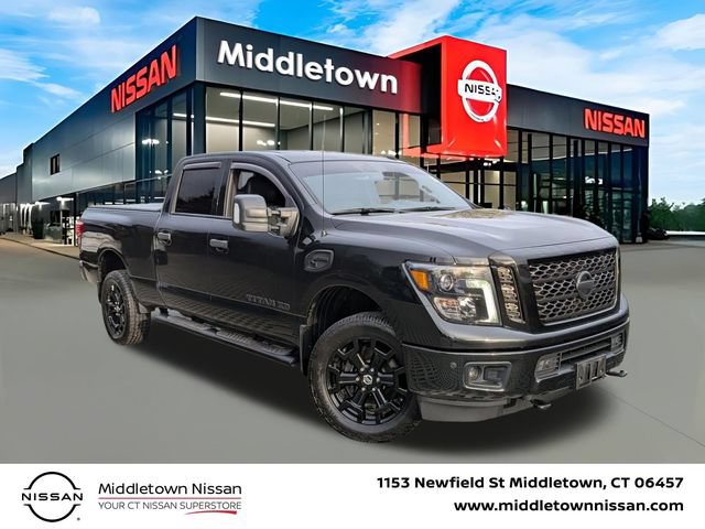 Used 2019 Nissan Titan SL w/ Midnight Edition AWD/4WD image 1