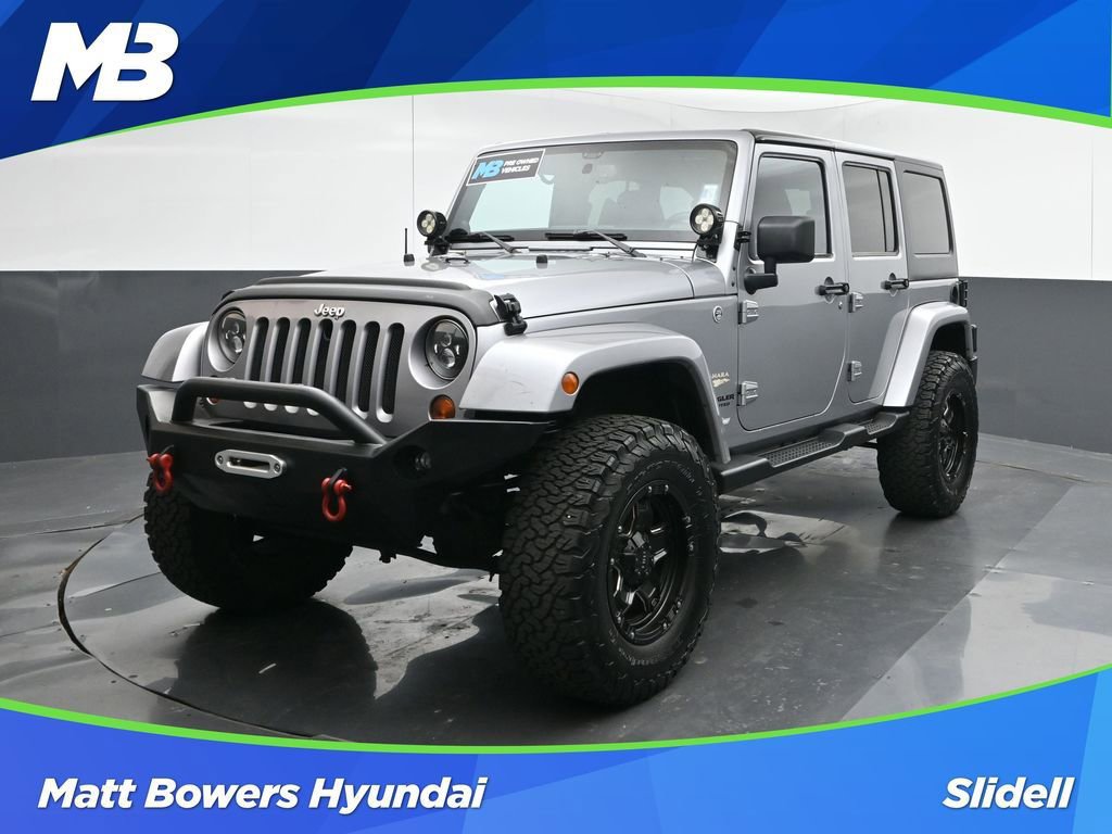 Used 2013 Jeep Wrangler Unlimited Sahara w/ Dual Top Group image 1
