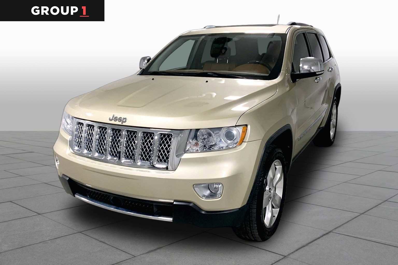 Used 2011 Jeep Grand Cherokee Overland Summit AWD/4WD image 1