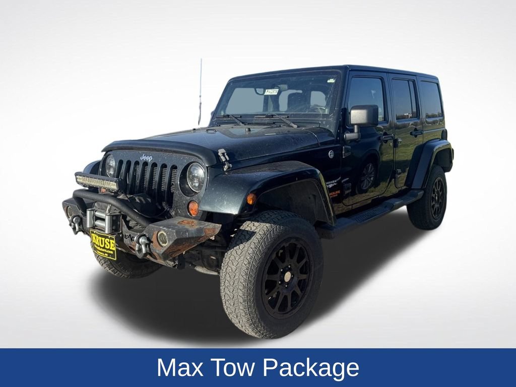 Used 2012 Jeep Wrangler Unlimited Sahara w/ Dual Top Group AWD/4WD image 13