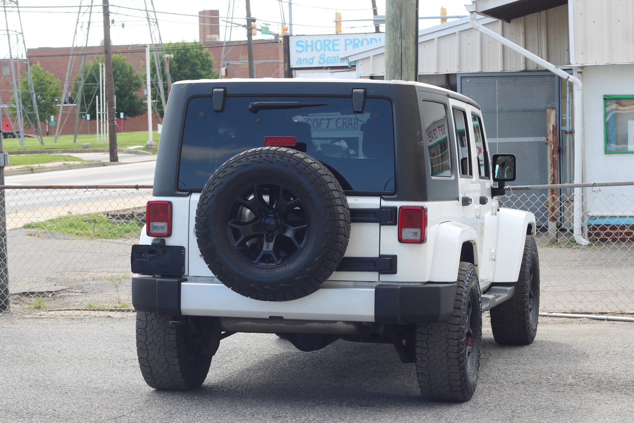 Used 2012 Jeep Wrangler Unlimited Sahara w/ Dual Top Group AWD/4WD image 8
