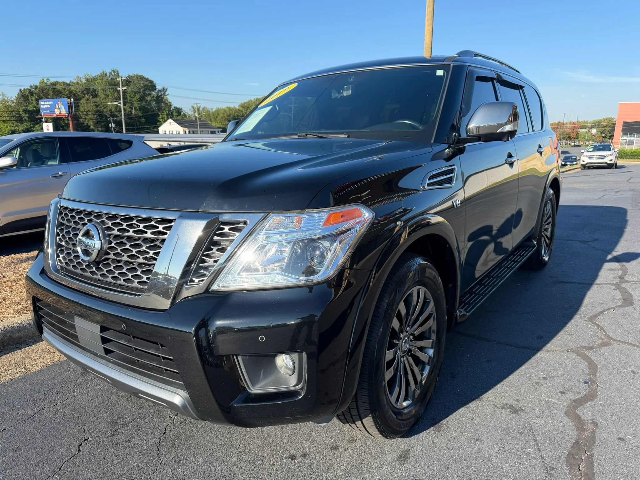 Used 2019 Nissan Armada Platinum w/ Captain's Chairs Package AWD/4WD image 3