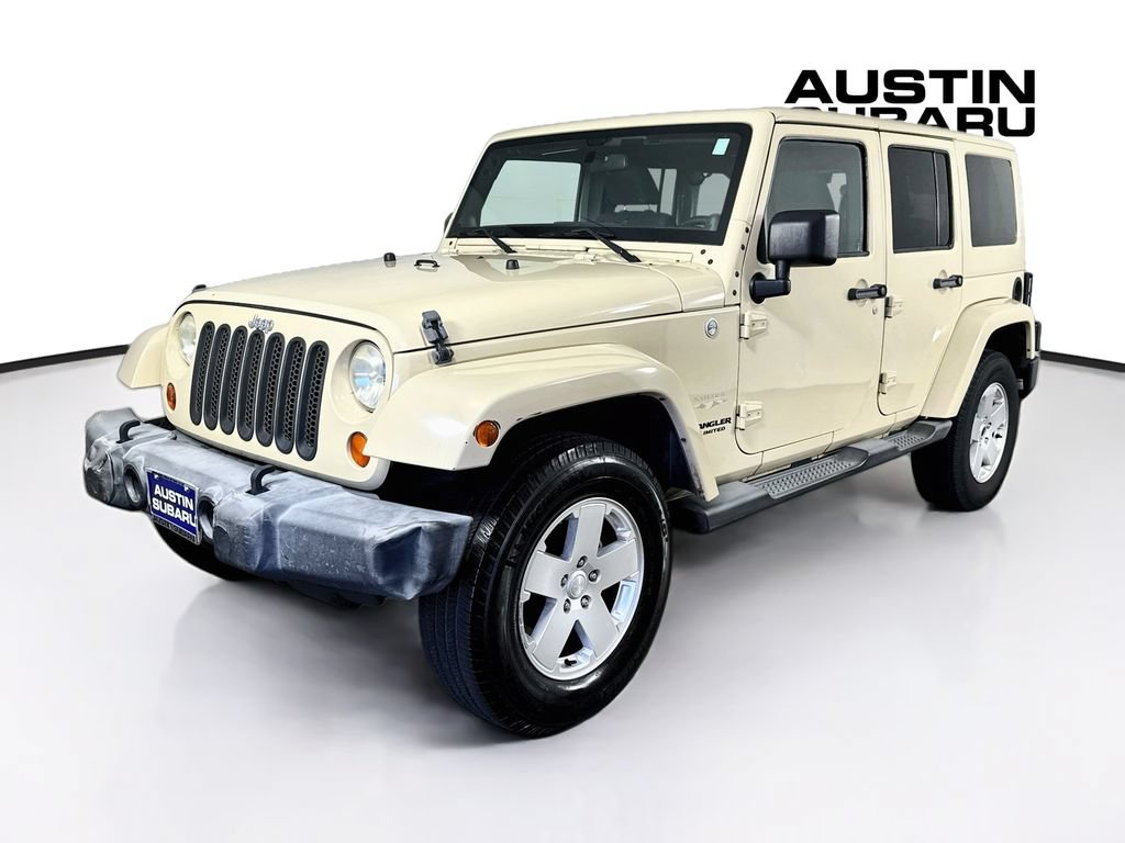 Used 2012 Jeep Wrangler Unlimited Sahara w/ Dual Top Group AWD/4WD image 3