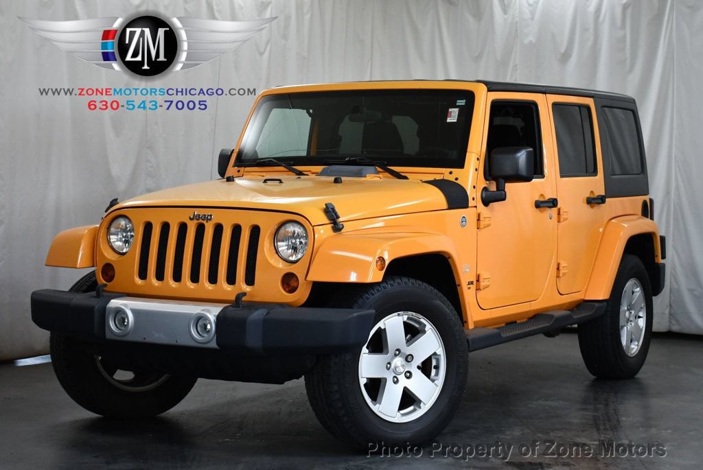 Used 2012 Jeep Wrangler Unlimited Sahara AWD/4WD image 1