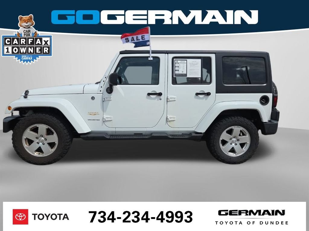 Used 2012 Jeep Wrangler Unlimited Sahara w/ Dual Top Group AWD/4WD image 11