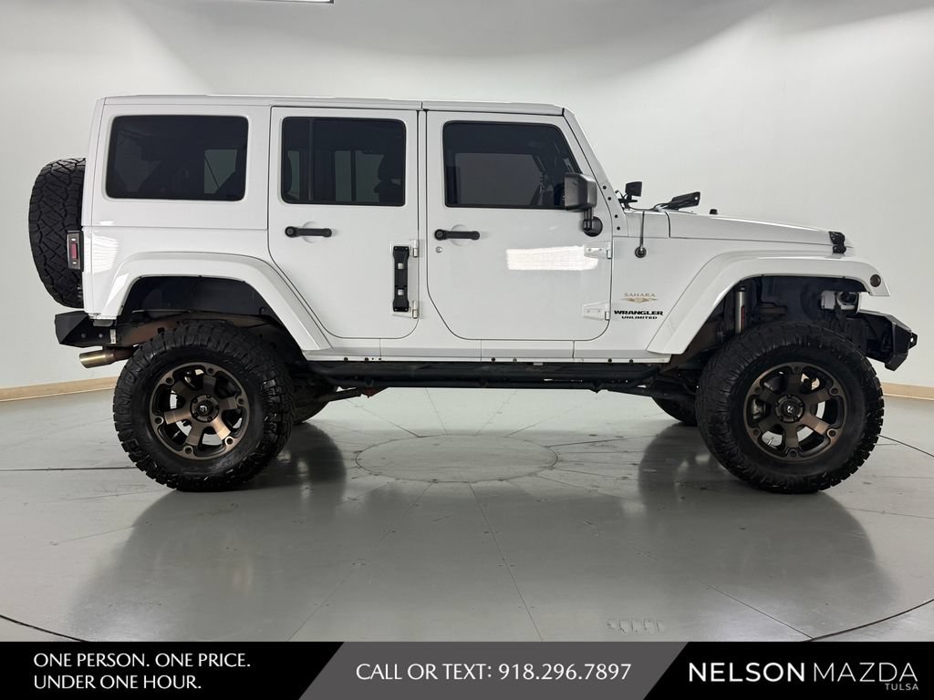 Used 2014 Jeep Wrangler Unlimited Sahara w/ Mopar Chrome Edition Group AWD/4WD image 5