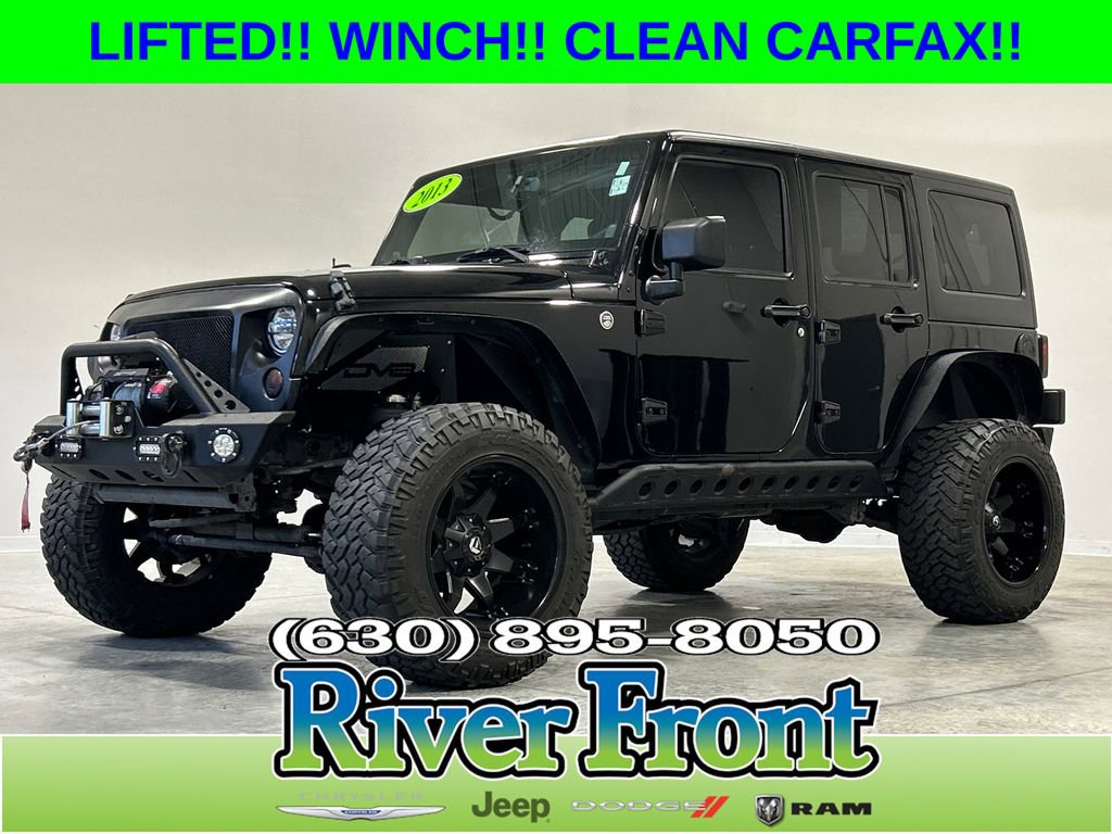 Used 2013 Jeep Wrangler Unlimited Sahara w/ Dual Top Group image 1