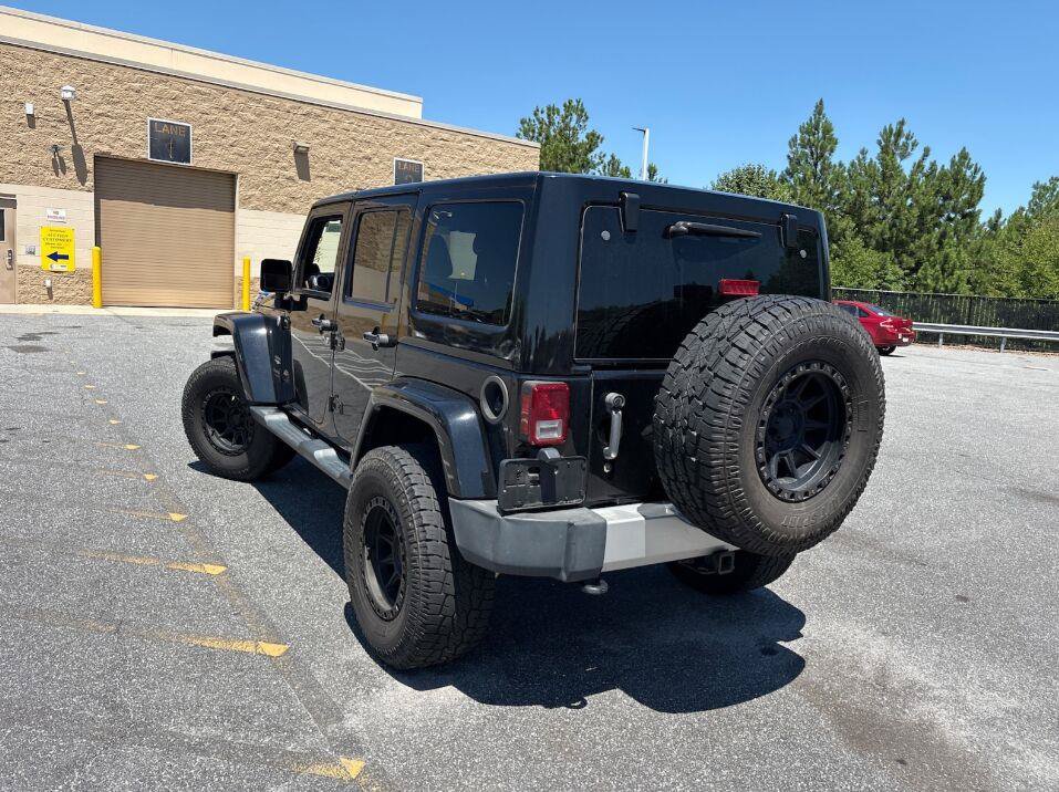 Used 2014 Jeep Wrangler Unlimited Sahara w/ Connectivity Group AWD/4WD image 4