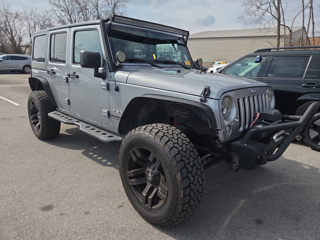 Used 2016 Jeep Wrangler Unlimited Sahara w/ Connectivity Group image 1