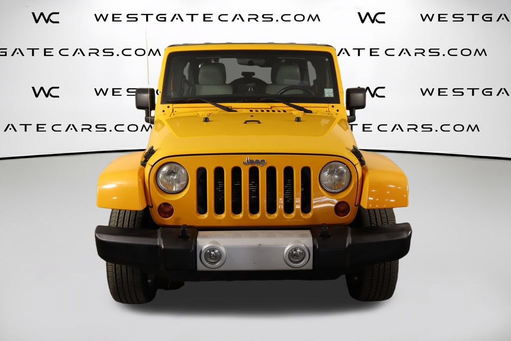 Used 2012 Jeep Wrangler Unlimited Sahara w/ Dual Top Group AWD/4WD image 2