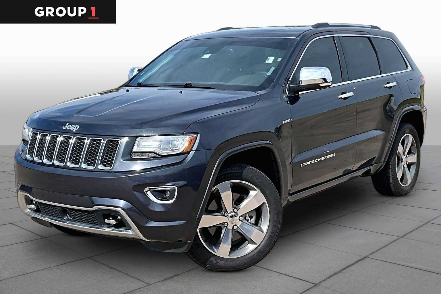 Used 2014 Jeep Grand Cherokee Overland w/ Advanced Technology Group AWD/4WD image 1