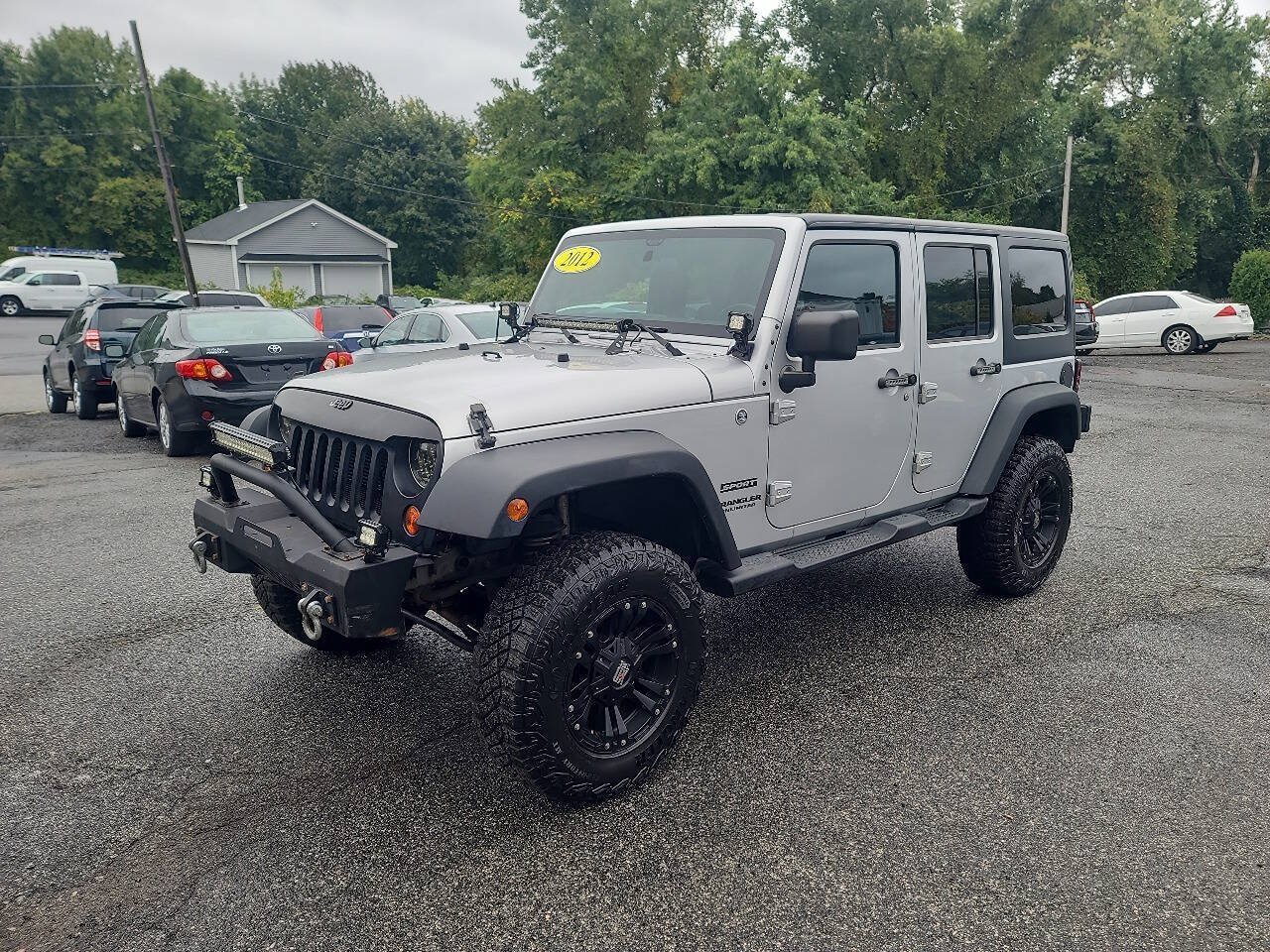 Used 2012 Jeep Wrangler Unlimited Sport w/ Dual Top Group AWD/4WD image 4