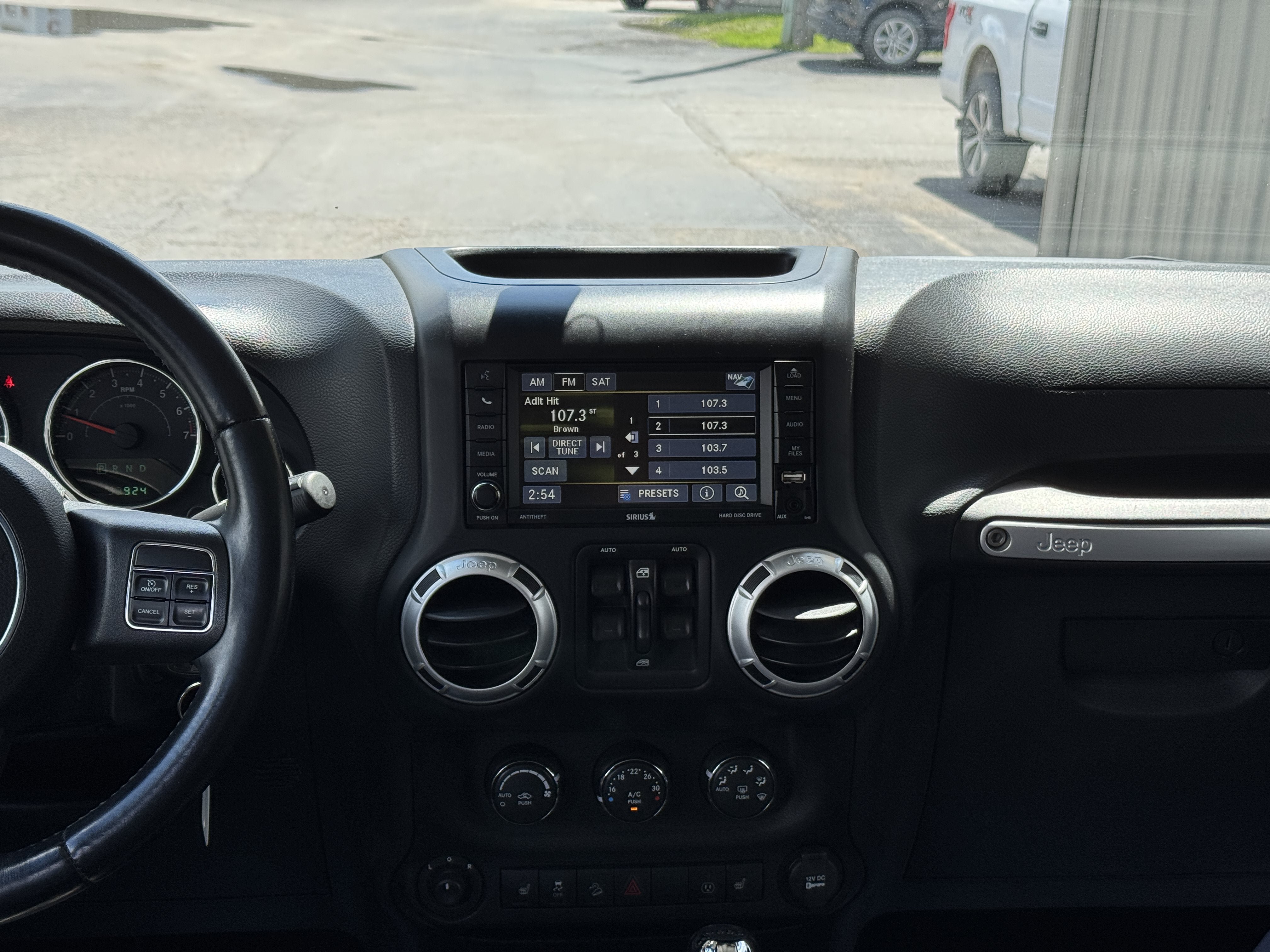Used 2013 Jeep Wrangler Unlimited Sahara w/ Dual Top Group AWD/4WD image 13