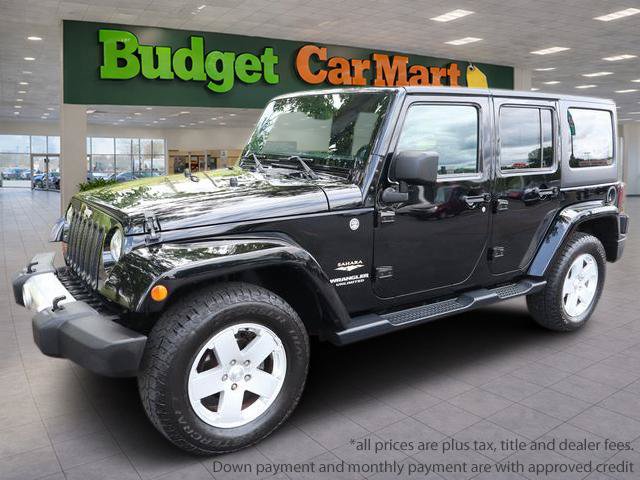 Used 2012 Jeep Wrangler Unlimited Sahara w/ Dual Top Group AWD/4WD video 1