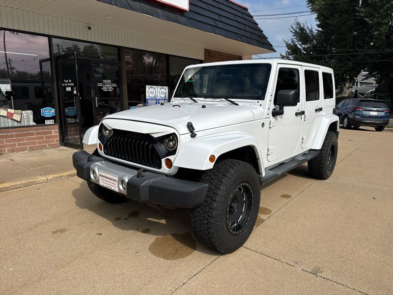 Used 2012 Jeep Wrangler Unlimited Sahara w/ Max Tow Pkg image 2