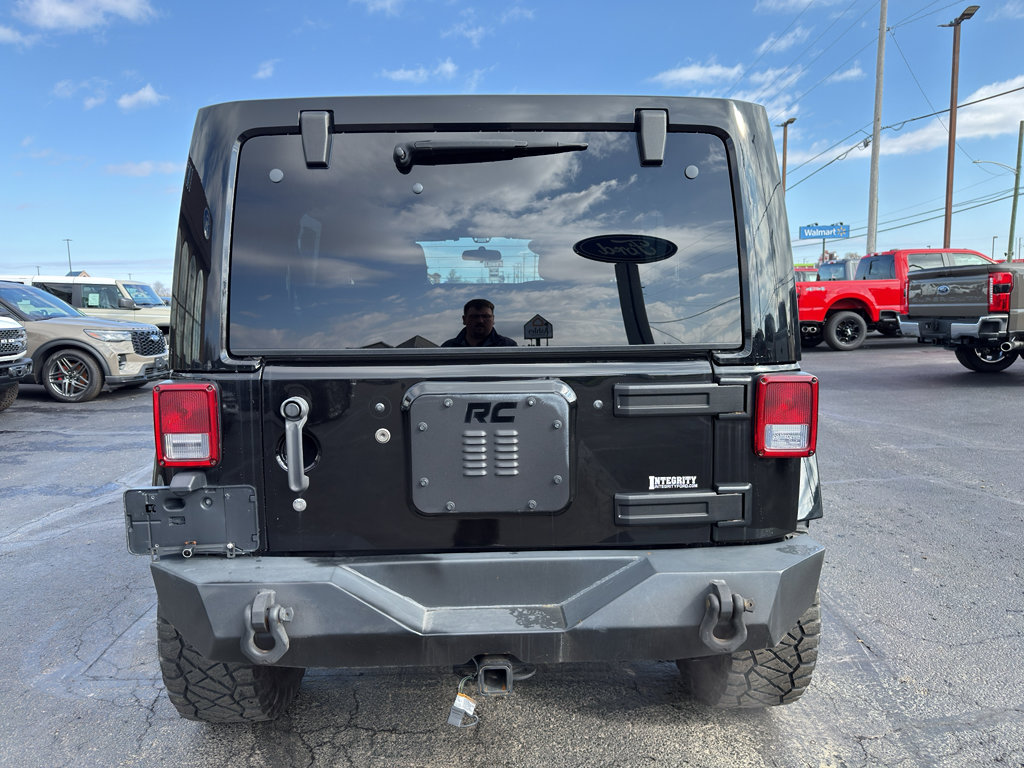 Used 2012 Jeep Wrangler Unlimited Sahara w/ Dual Top Group AWD/4WD image 6