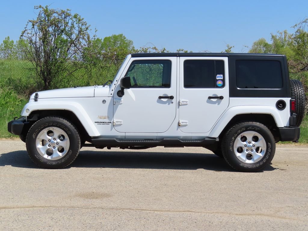 Used 2013 Jeep Wrangler Unlimited Sahara w/ Dual Top Group AWD/4WD image 7
