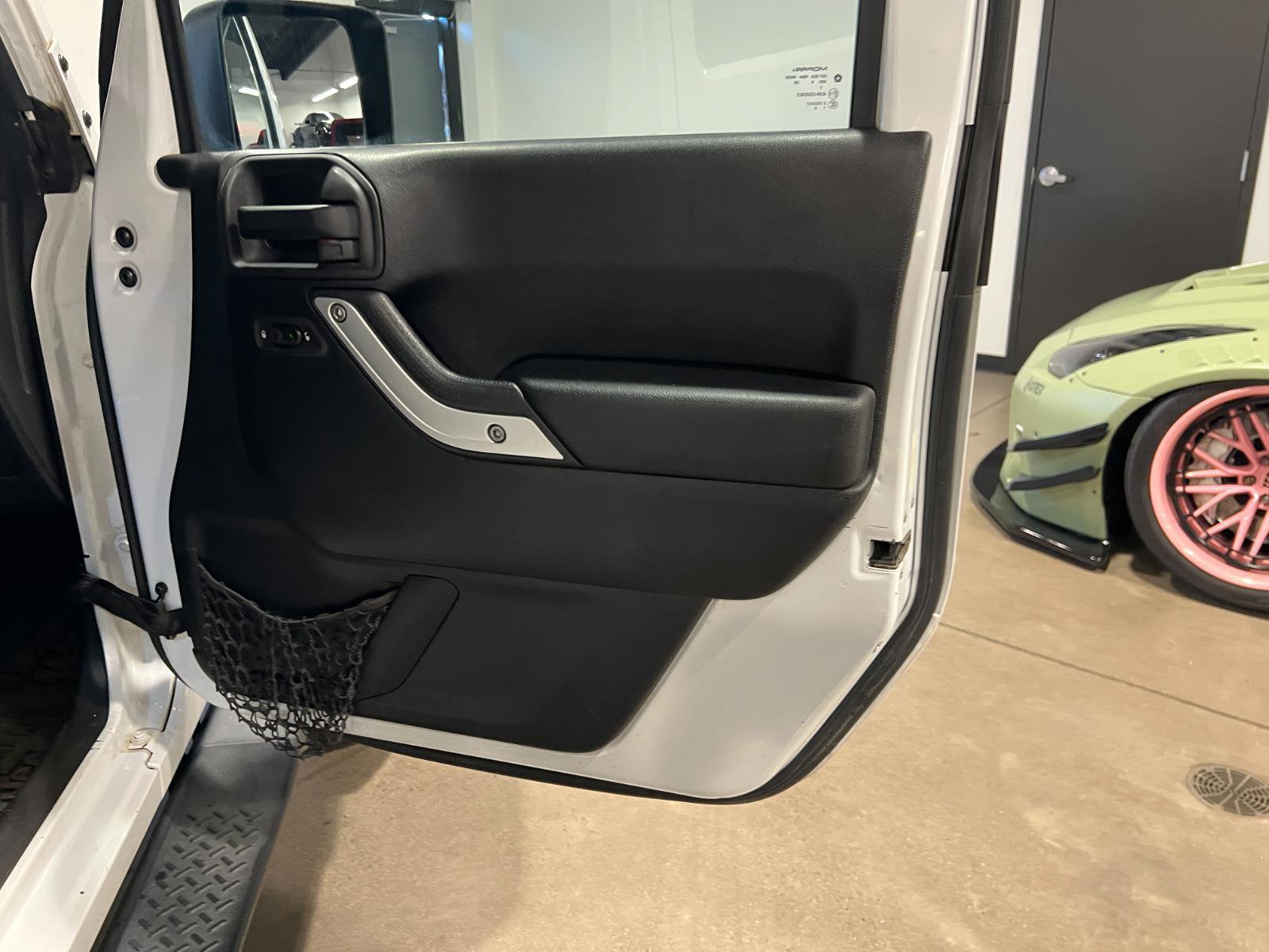 Used 2014 Jeep Wrangler Unlimited Rubicon w/ Dual Top Group image 32