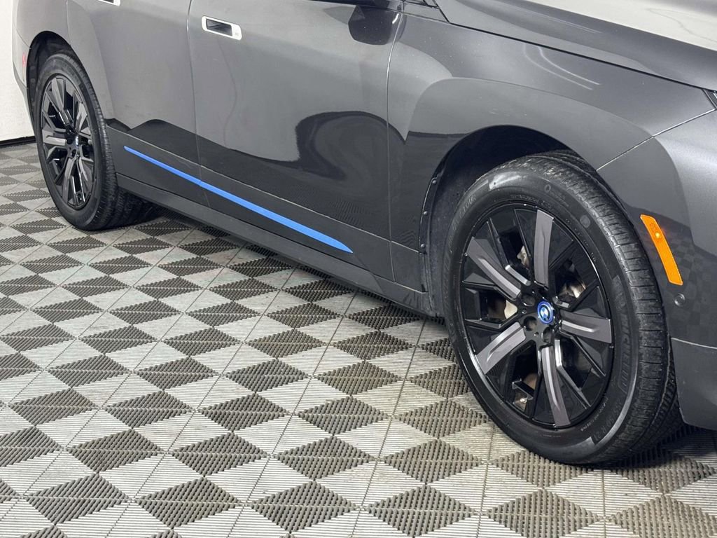 Used 2023 BMW iX xDrive50 w/ BMW I Signature Blue Package AWD/4WD image 12