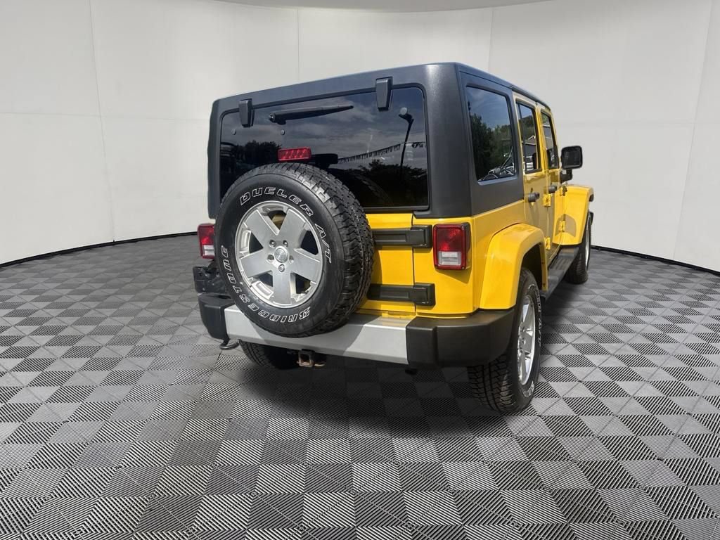 Used 2011 Jeep Wrangler Unlimited Sahara w/ Dual Top Group AWD/4WD image 12