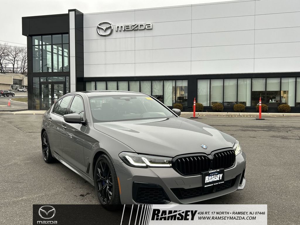 Used 2022 BMW M550i xDrive w/ Executive Package image 1