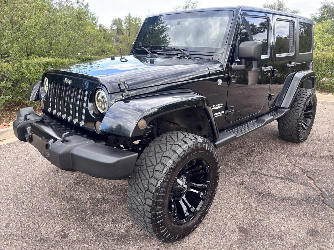 Used 2013 Jeep Wrangler Unlimited Sahara w/ Dual Top Group AWD/4WD image 4