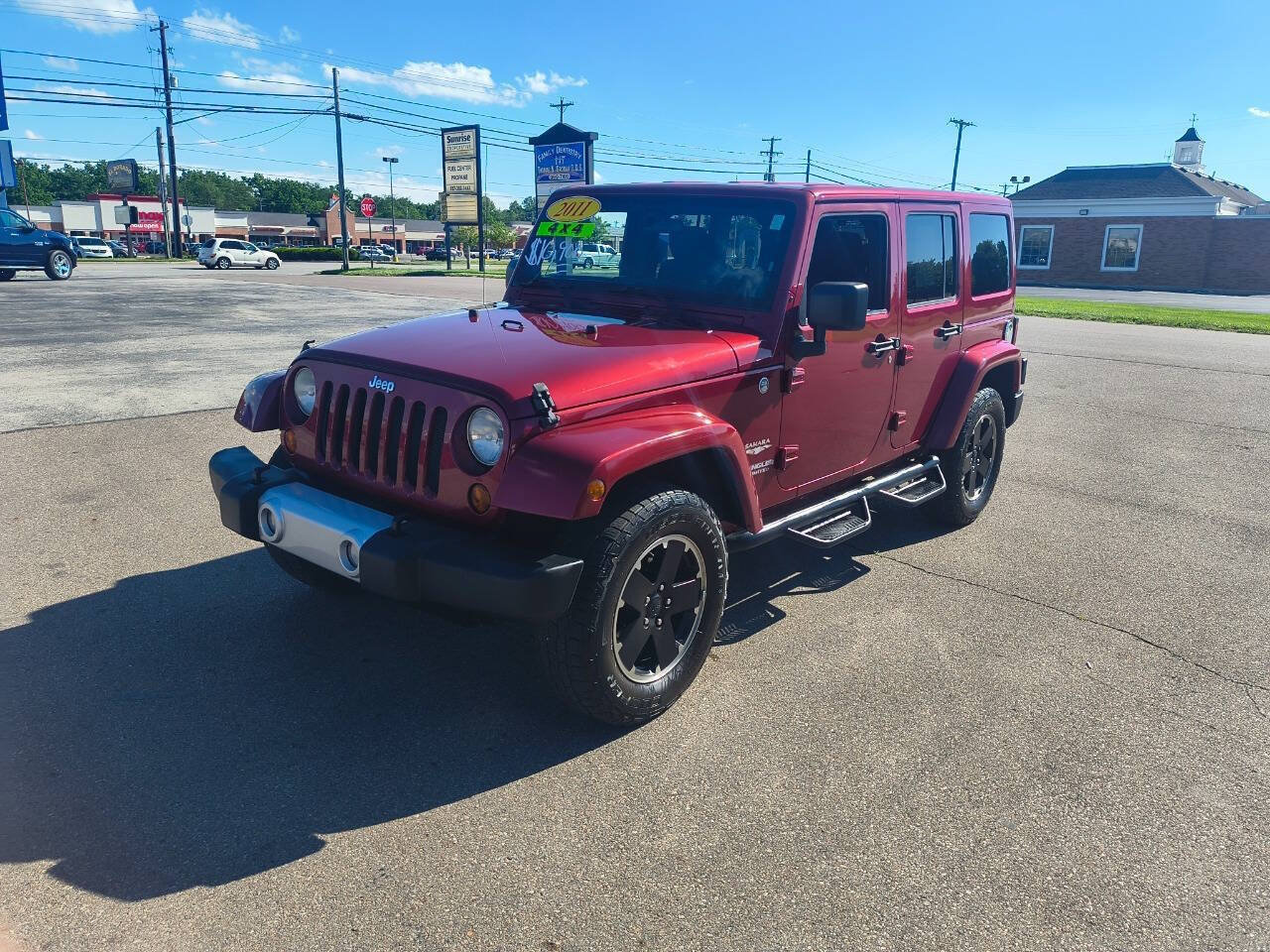 Used 2011 Jeep Wrangler Unlimited Sahara w/ Dual Top Group AWD/4WD image 12