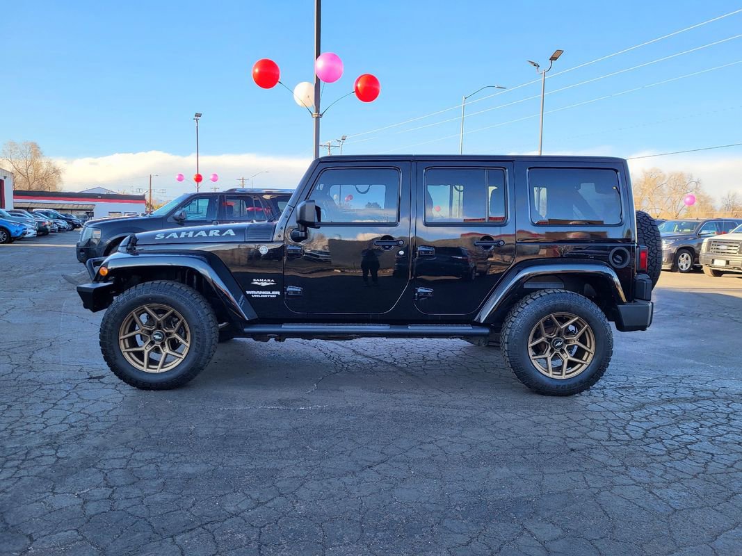 Used 2012 Jeep Wrangler Unlimited Sahara w/ Dual Top Group image 6