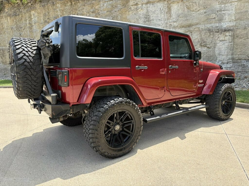 Used 2013 Jeep Wrangler Unlimited Sahara w/ Dual Top Group AWD/4WD image 12