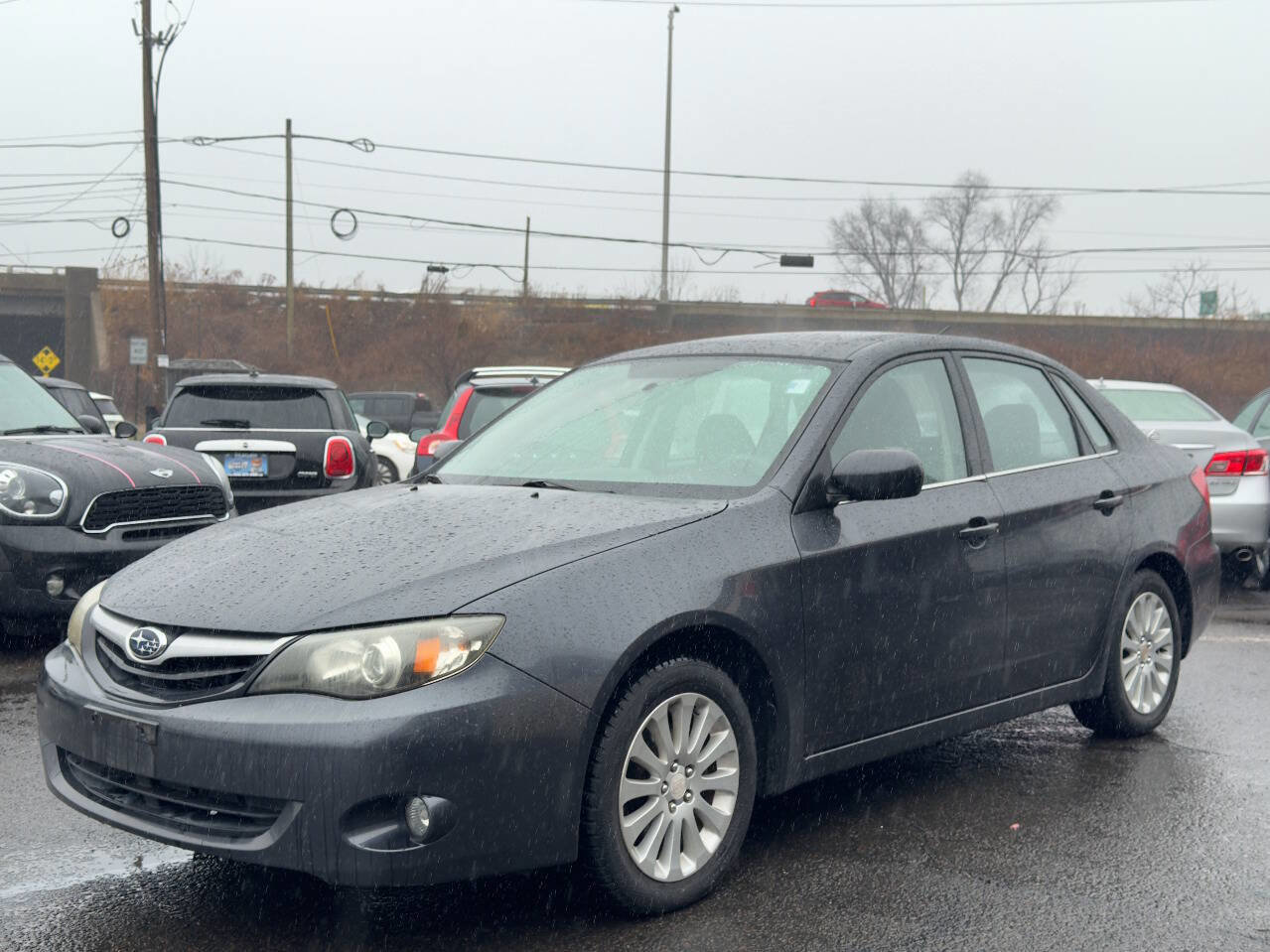Used 2011 Subaru Impreza 2.5i Premium w/ PWR Moonroof Value Pkg image 2