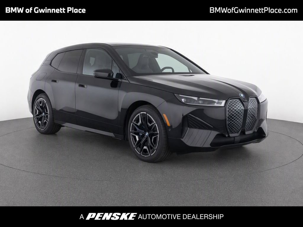 Used 2024 BMW iX xDrive50 w/ Premium Package AWD/4WD image 1