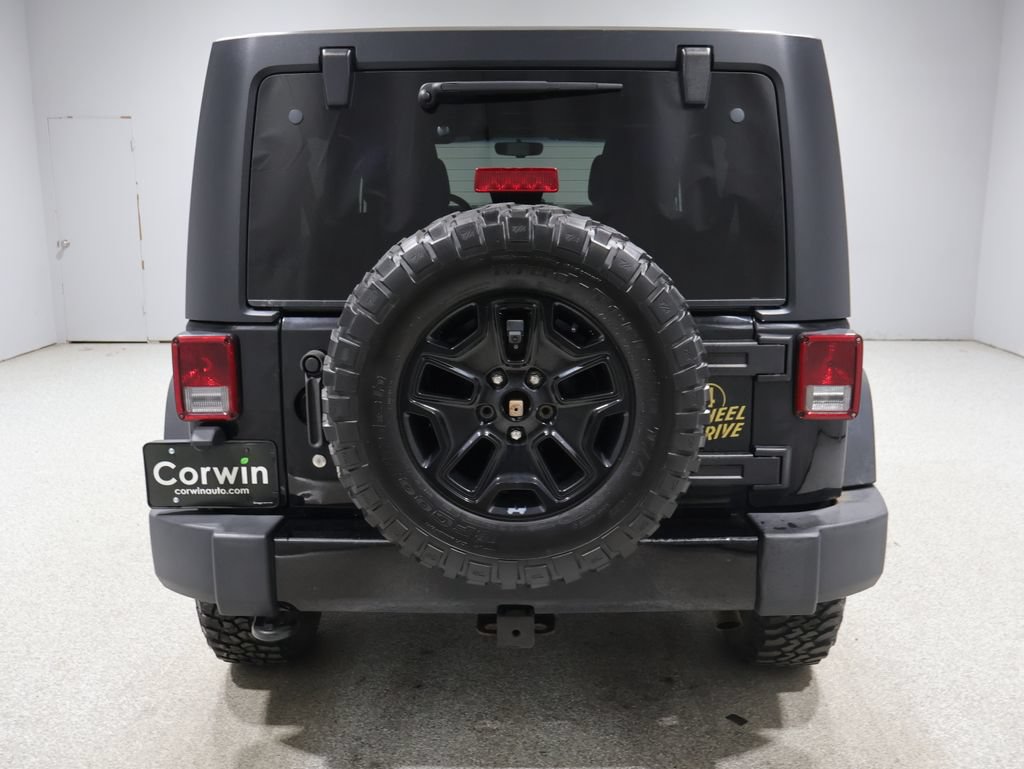 Used 2015 Jeep Wrangler Unlimited Sport AWD/4WD video 3