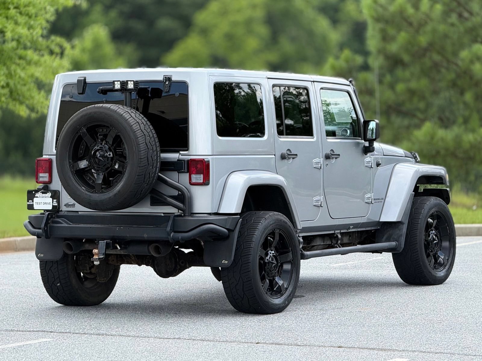 Used 2014 Jeep Wrangler Unlimited Rubicon w/ Dual Top Group AWD/4WD image 11