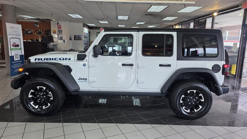 Used 2024 Jeep Wrangler Unlimited Rubicon 4xe AWD/4WD image 1