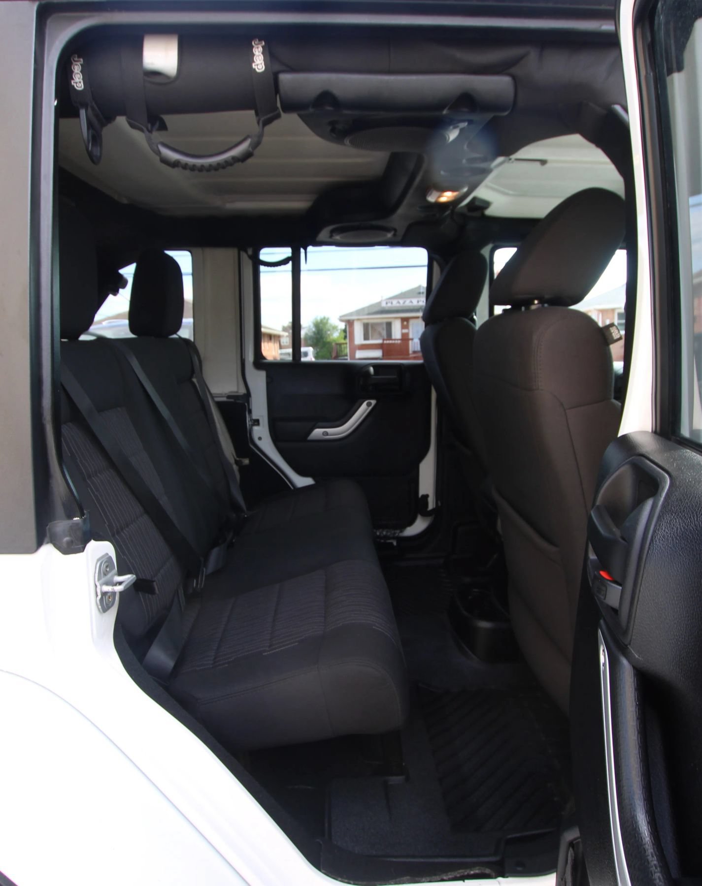 Used 2012 Jeep Wrangler Unlimited Sahara w/ Dual Top Group AWD/4WD image 12