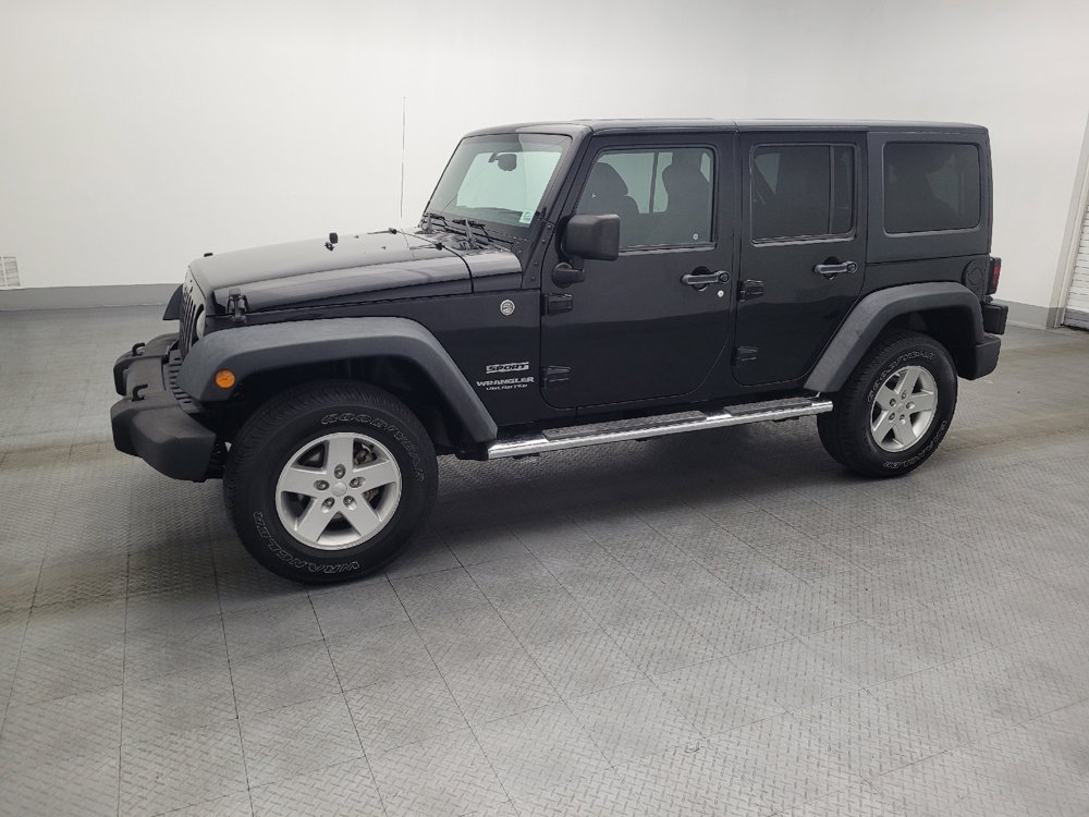 Used 2013 Jeep Wrangler Unlimited Sport image 2