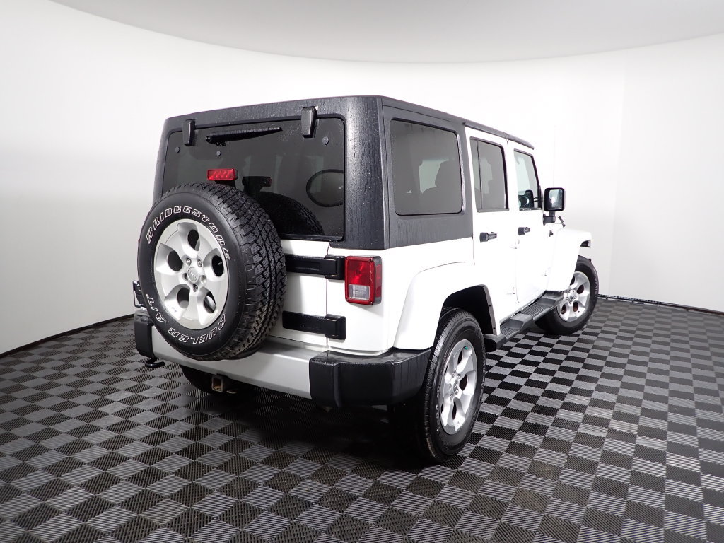 Used 2013 Jeep Wrangler Unlimited Sahara w/ Dual Top Group AWD/4WD image 14