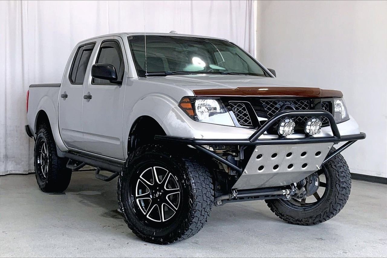 Used 2013 Nissan Frontier SV AWD/4WD image 1