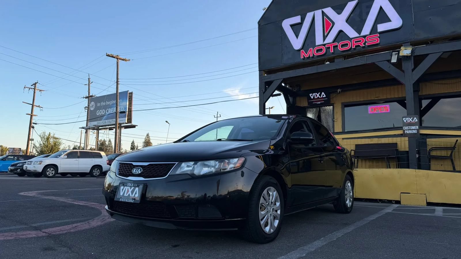 Used 2011 Kia Forte EX FWD image 1