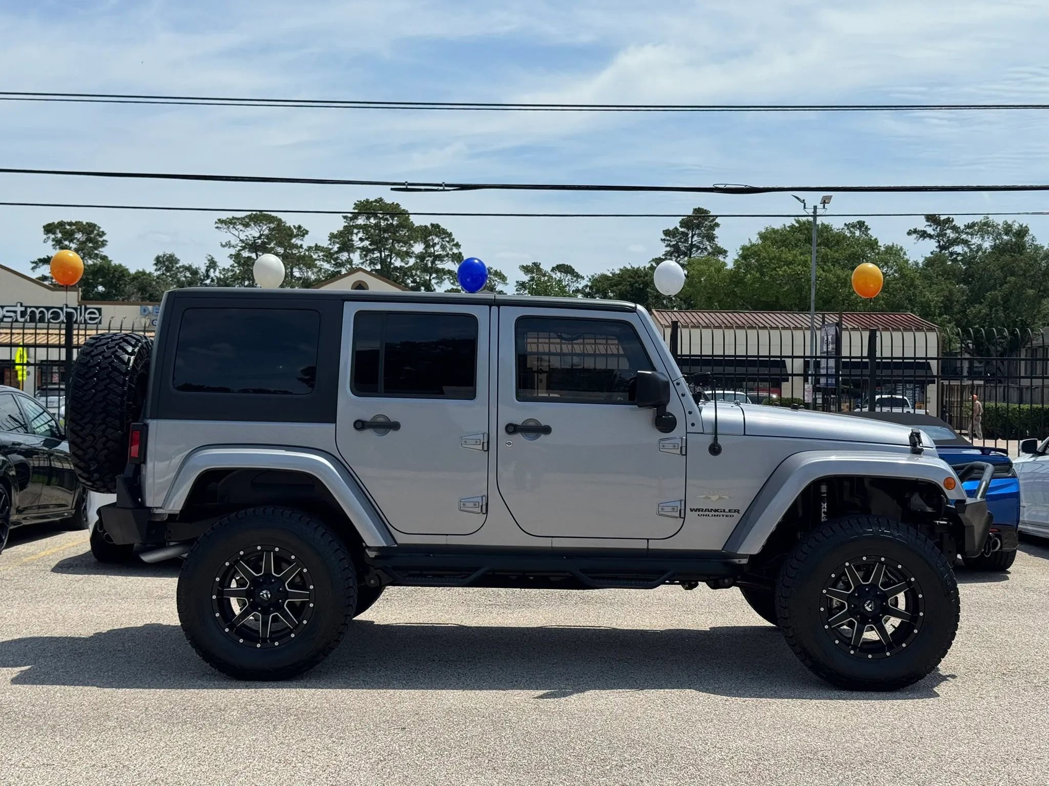 Used 2014 Jeep Wrangler Unlimited Sahara w/ Max Tow Package AWD/4WD image 11