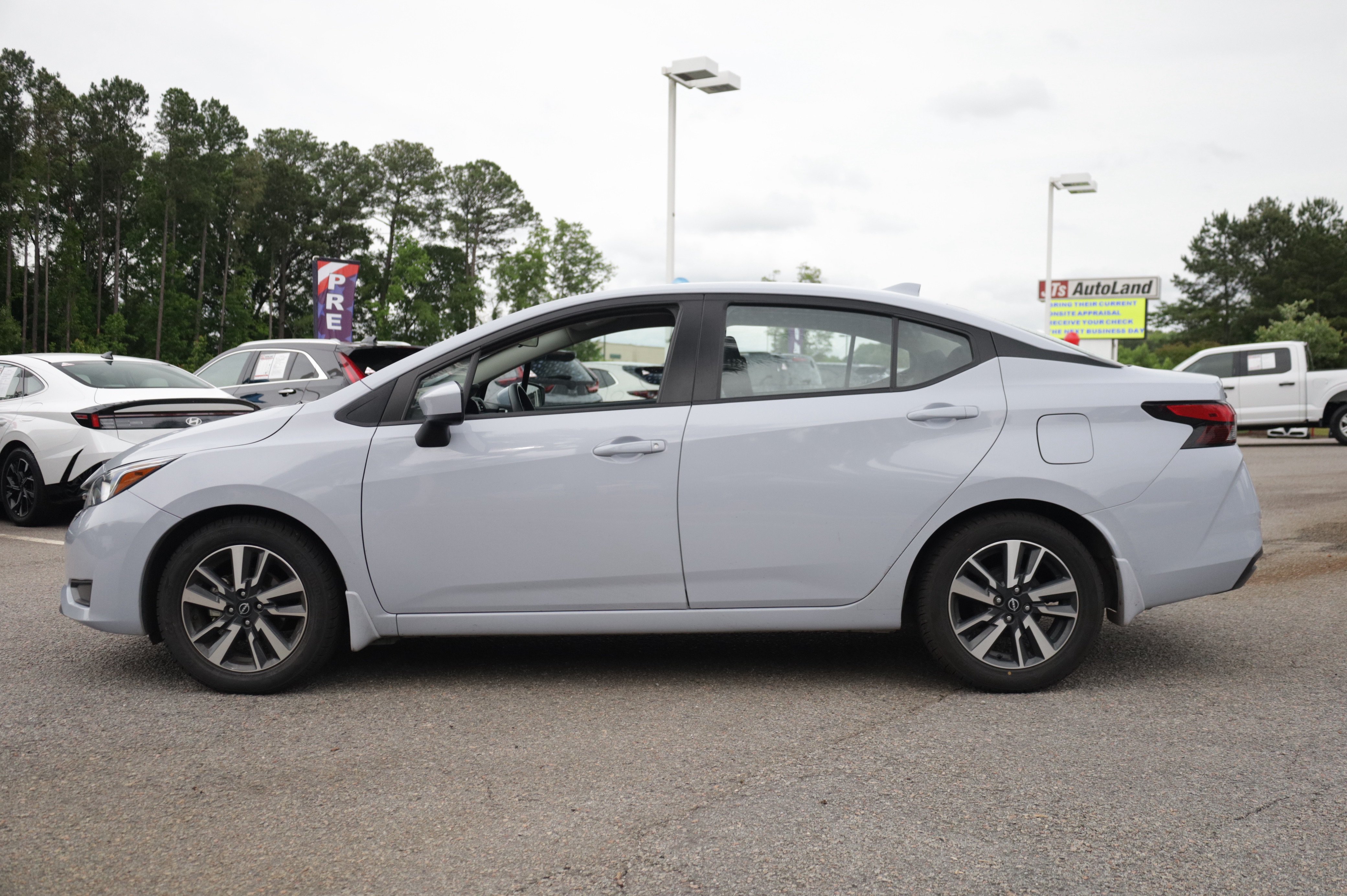Used 2024 Nissan Versa SV w/ Trunk Package FWD image 2