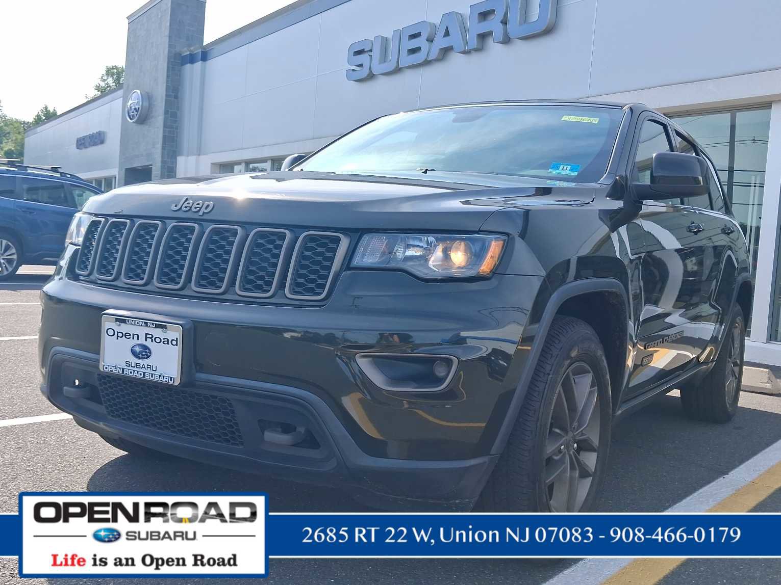 Used 2016 Jeep Grand Cherokee Laredo 75th Anniversary AWD/4WD image 1