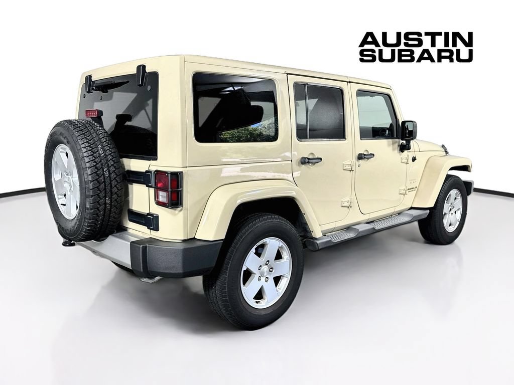 Used 2012 Jeep Wrangler Unlimited Sahara w/ Dual Top Group AWD/4WD image 7