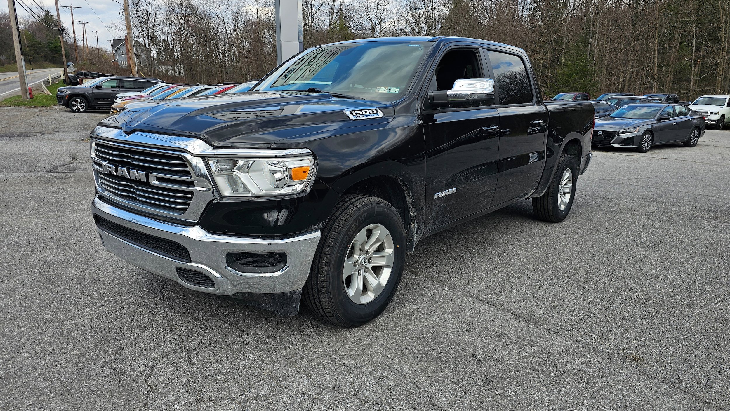 Used 2024 RAM 1500 Laramie AWD/4WD image 1
