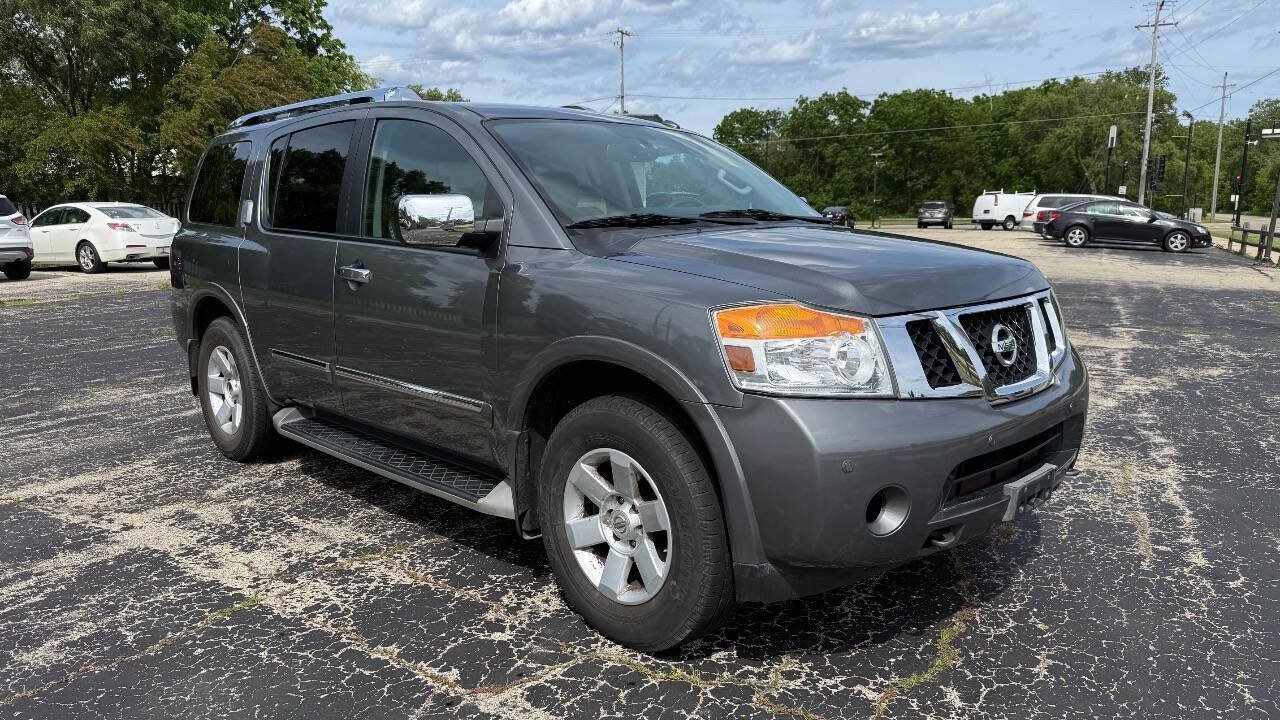 Used 2015 Nissan Armada Platinum w/ 2nd Row Captain Seat Package AWD/4WD image 1