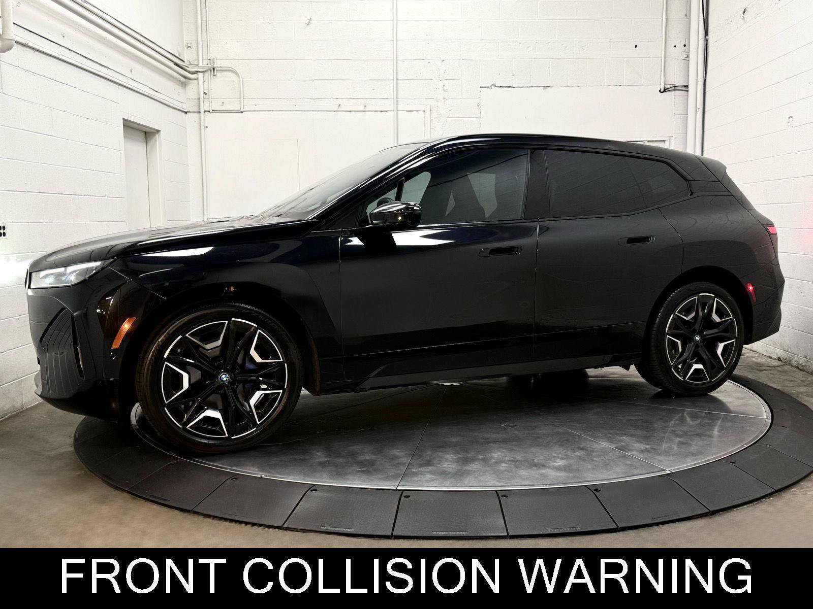Used 2024 BMW iX xDrive50 w/ Sport Package AWD/4WD image 4