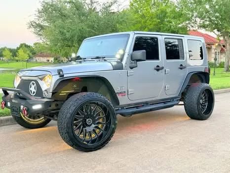 Used 2013 Jeep Wrangler Unlimited Sport